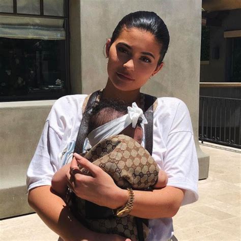 gucci baby carrier kylie jenner|Kylie Jenner dresses Stormi in Gucci baby carrier.